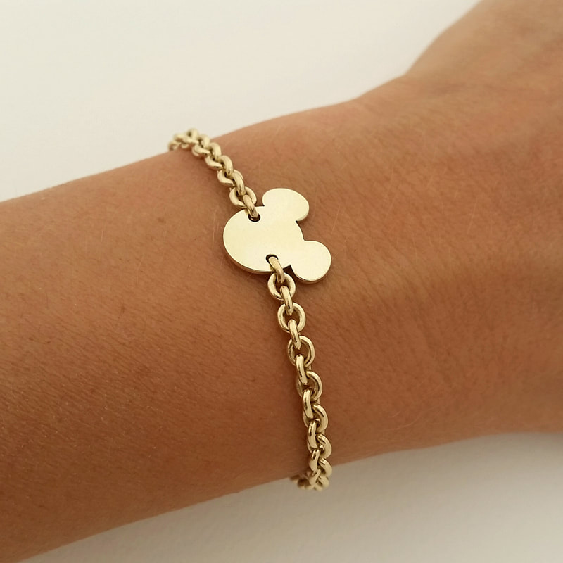 Mickey oval chains bracelet 14K yellow gold with mickey silhouette Daphne Meesters Jewellery Designer Goldsmith The Hague Netherlands