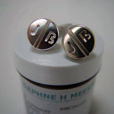 Pills cuff-links shiny finish round pill shape sterling silver with initials pharmacy graduation gift Daphne Meesters Jewellery Designer Goldsmith The Hague Netherlands
