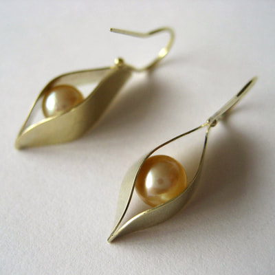 Earrings 14K yellow gold and yellow pearls evil eye Daphne Meesters Jewellery Designer Goldsmith The Hague Netherlands