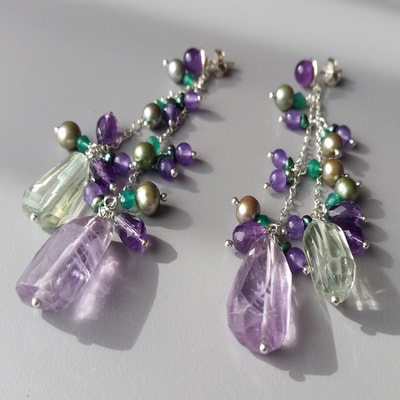 Amethyst sphere ear studs € 39,50 with ear jackets from sterling silver fine chain green purple faceted amethyst green pearls green agate 83 millimeters € 95,- Daphne Meesters Jewellery Designer Goldsmith The Hague Netherlands
