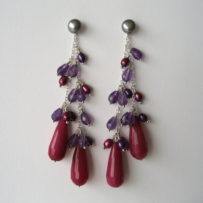 Ear studs dangling ear jackets sterling silver fine chain faceted purple amethyst drops pink jade briolettes and grey pearls Daphne Meesters Jewellery Designer Goldsmith The Hague Netherlands
