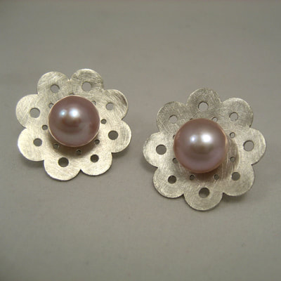 White lace ear jackets 22 millimeters sterling silver € 83,- and ear studs sterling silver pink pearls 10 millimeters € 39,50 Daphne Meesters Jewellery Designer Goldsmith The Hague Netherlands