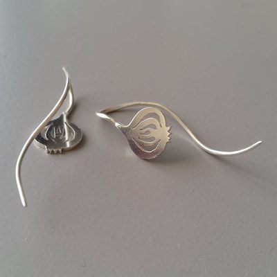Onions ear wires hand pierced contemporary sterling silver Daphne Meesters Jewellery Designer Goldsmith The Hague Netherlands
