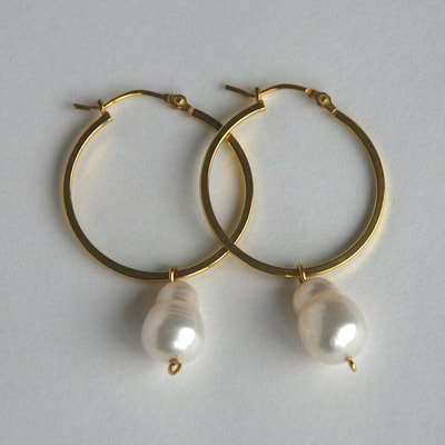 Matryoska madness hoop earrings From Russia with love collection sterling silver 14K gold layer with  white matryoska shaped pearls € 82,50 sold Daphne Meesters Jewellery Designer Goldsmith The Hague Netherlands