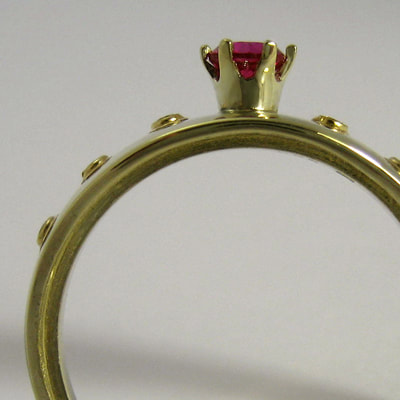 Red princess engagement ring layered line 14K yellow gold ruby diamonds Daphne Meesters Jewellery Designer Goldsmith The Hague Netherlands
