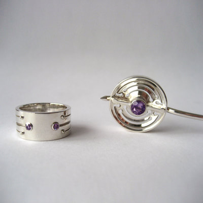 Soyuz contemporary jewellery set ring & brooch sterling silver and faceted amethyst lines pattern with balls Daphne Meesters Jewellery Designer Goldsmith The Hague Netherlands