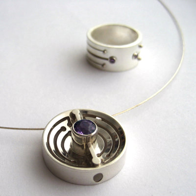 Soyuz contemporary jewellery set ring & pendant sterling silver and faceted amethyst lines pattern with balls Daphne Meesters Jewellery Designer Goldsmith The Hague Netherlands