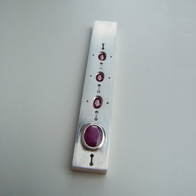 Rectangular pendant dot stripe decoration sterling silver and pink oval faceted rubies Daphne Meesters Jewellery Designer Goldsmith The Hague Netherlands

