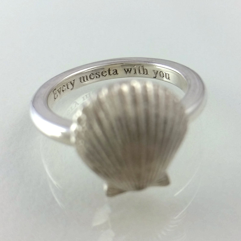 Camino de Santiago ring sterling silver with miniature casted St James scallop and engraving Daphne Meesters Jewellery Designer Goldsmith The Hague Netherlands