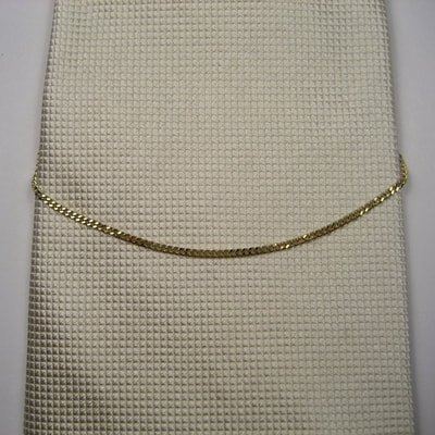 Hang in there tie chain single strand flat curb chain 14K yellow gold with  buttonhook men's formal Daphne Meesters Jewellery Designer Goldsmith The Hague Netherlands
