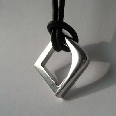 Blended contradictions wedding pendant open rounded square sterling silver on black leather strap Daphne Meesters Jewellery Designer Goldsmith The Hague Netherlands
